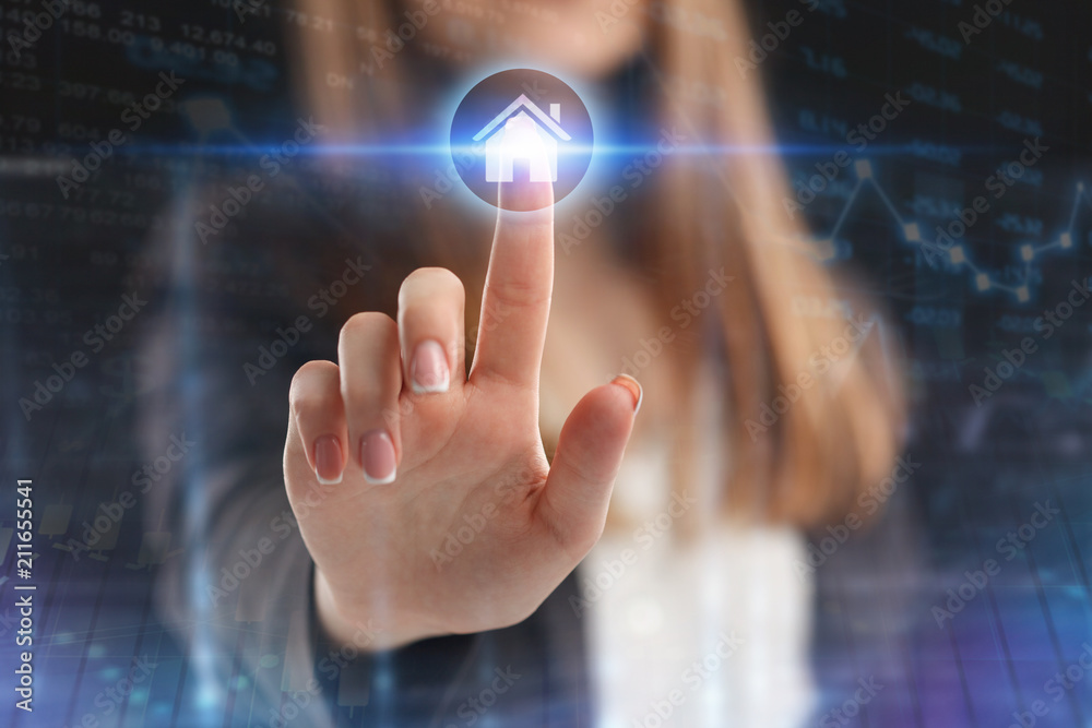 The concept of business, technology, the Internet and the network. A young entrepreneur working on a virtual screen of the future and sees the inscription: The concept of business, technology, the Internet and the network. A young entrepreneur working on a virtual screen of the future and sees the inscription: