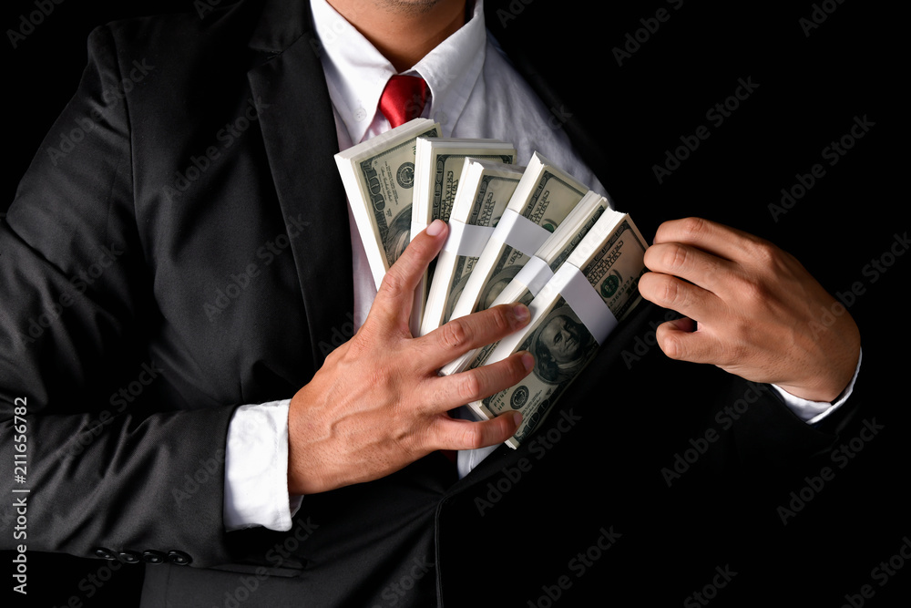 Finance Business Concepts. Lots of money on a black background. Investments are a necessity of business. Finance Business Concepts. Lots of money on a black background. Investments are a necessity of business.