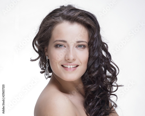 Portrait of a young woman with makeup isolated on white