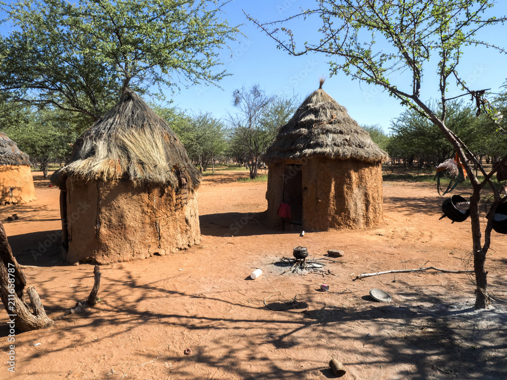 NORTH NAMIBIA, MAY 6 2018: Woman tribe Himba, with children, May 6 2018, North Namibia NORTH NAMIBIA, MAY 6 2018: Woman tribe Himba, with children, May 6 2018, North Namibia