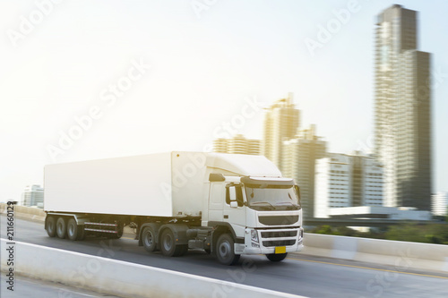 White Truck on highway road container, transportation concept.,import,export logistic industrial Transporting Land transport on the expressway