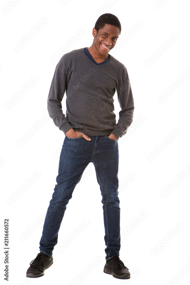 Full length cool young black man standing against isolated white background Full length cool young black man standing against isolated white background