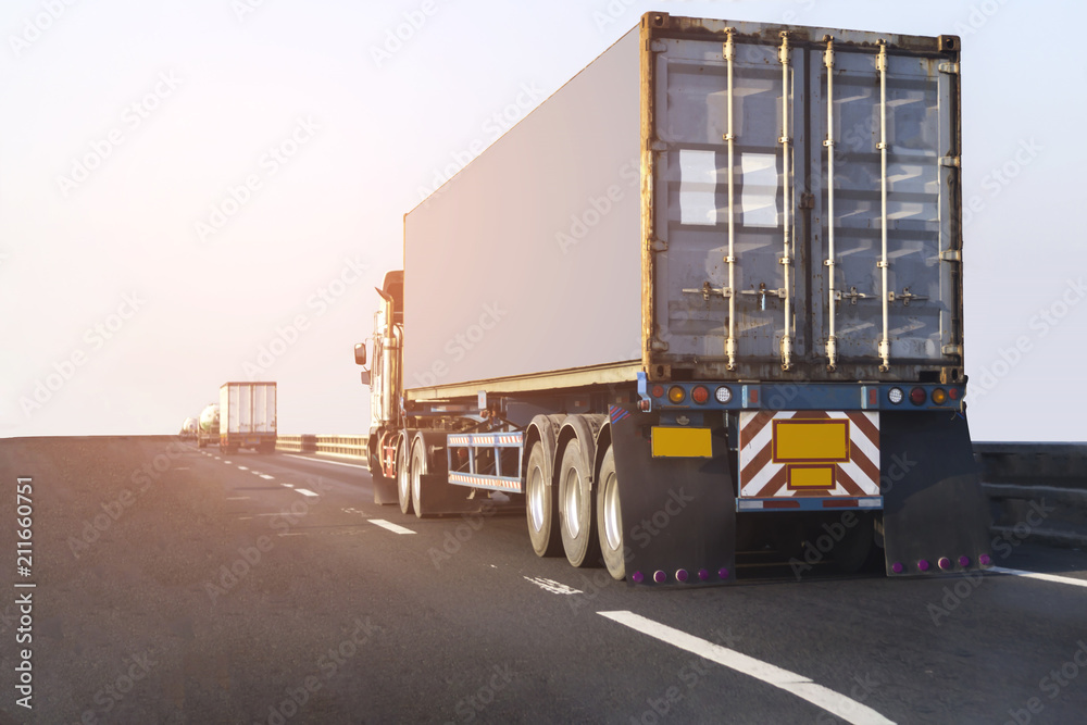 Truck on highway road with container, transportation concept.,import,export logistic industrial Transporting Land transport on the asphalt expressway. Truck on highway road with container, transportation concept.,import,export logistic industrial Transporting Land transport on the asphalt expressway.