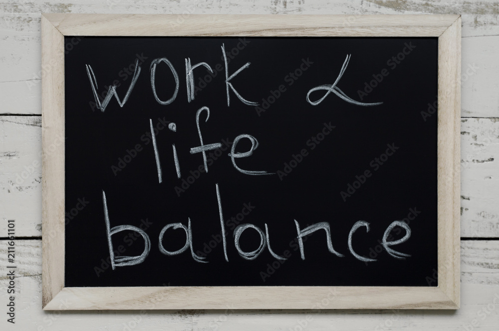 Work and life balance concept. Blackboard with handwritten text