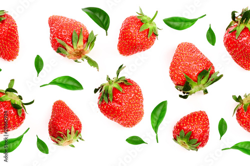 Strawberries decorated with leaves isolated on white background with copy space for your text. Top view. Flat lay