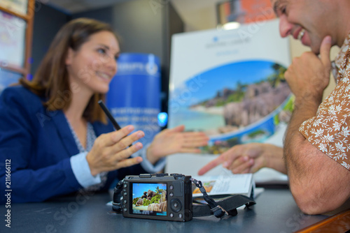 Travel agent with client