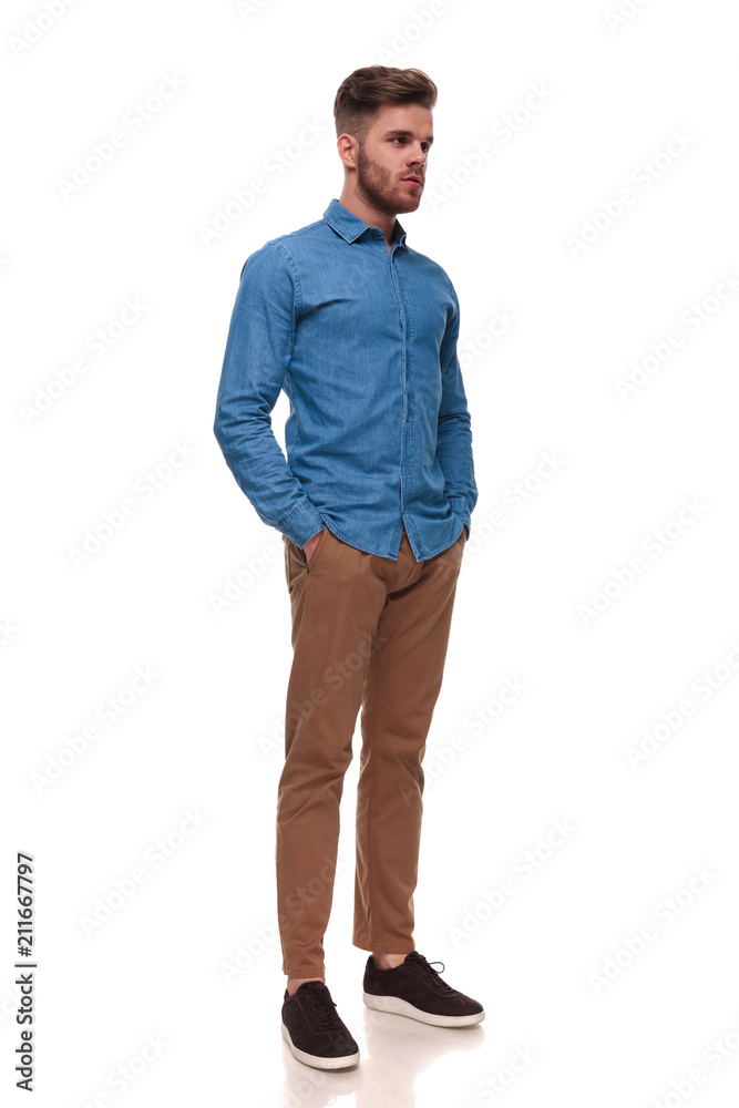 Fototapeta premium relaxed casual man standing looks to side