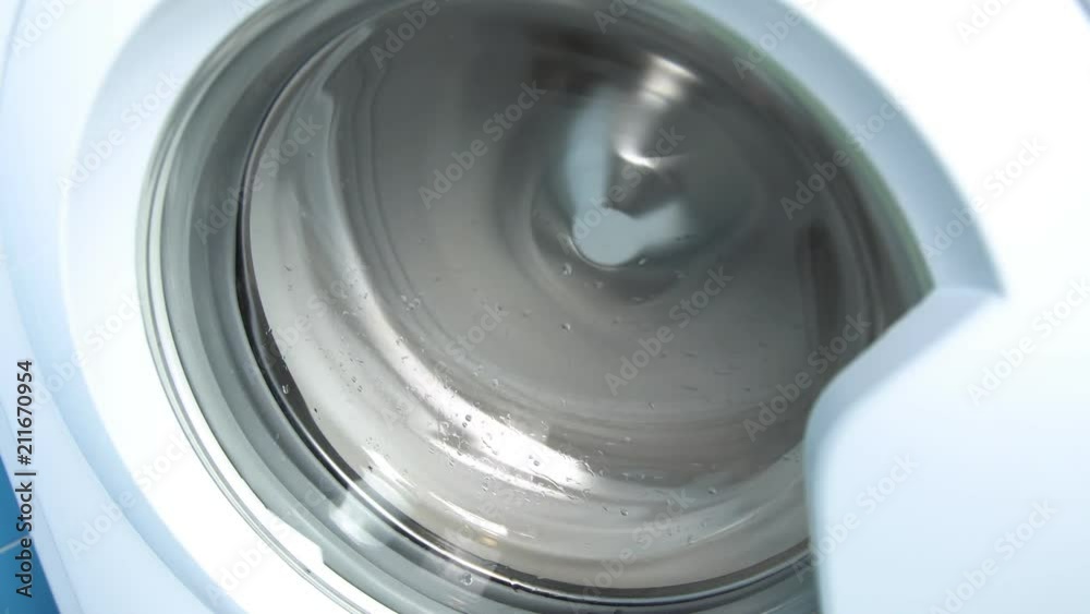 Washing machine washes white clothing and sheets Washing machine washes white clothing and sheets