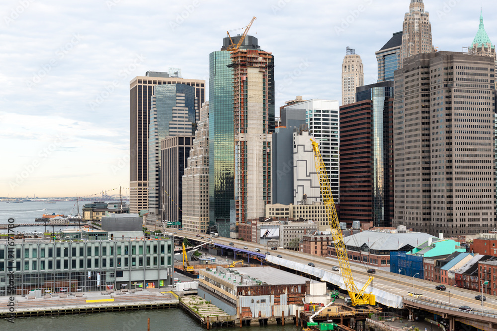 Fototapeta premium New York City / USA - JUN 20 2018: Skyscraper and old buildings in the Financial District of Lower Manhattan in New York City