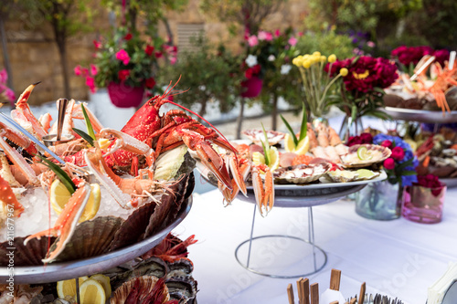 Seafood dish served on the restaurant table photo