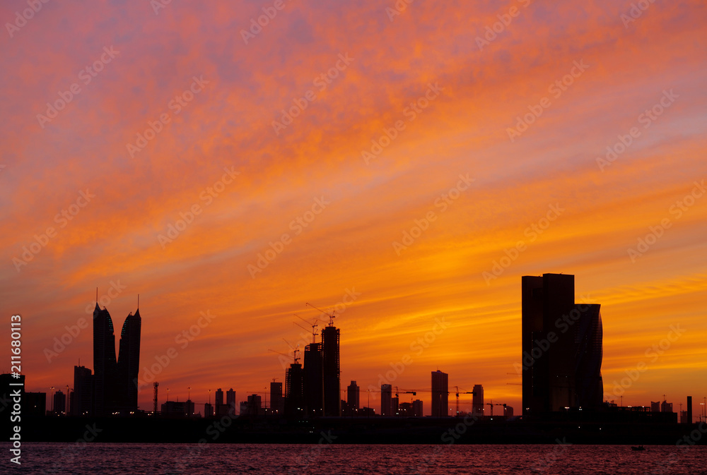 Bahrain skyline and dramatic sky during sunset
