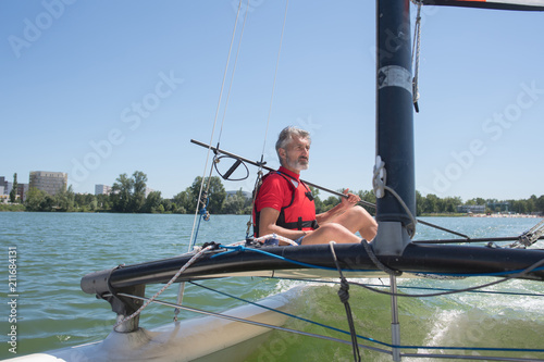 man sailing alone