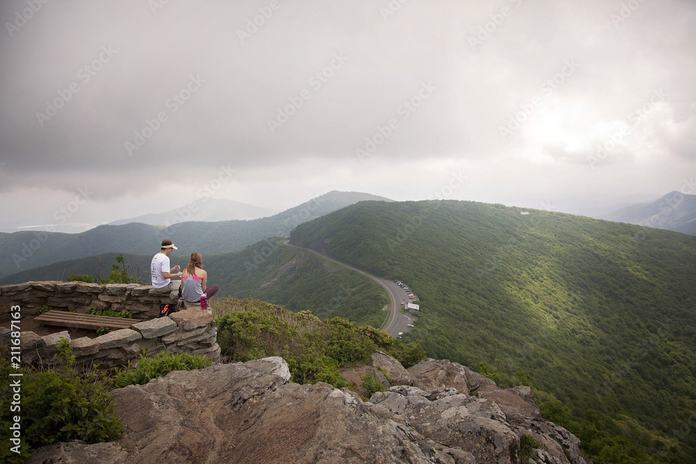 Couple enjoying lunch at mountain overlook Couple enjoying lunch at mountain overlook