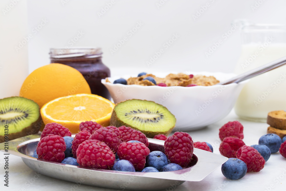 fresh fruit in the foreground with cereals and breakfast in the background, healthy food fresh fruit in the foreground with cereals and breakfast in the background, healthy food