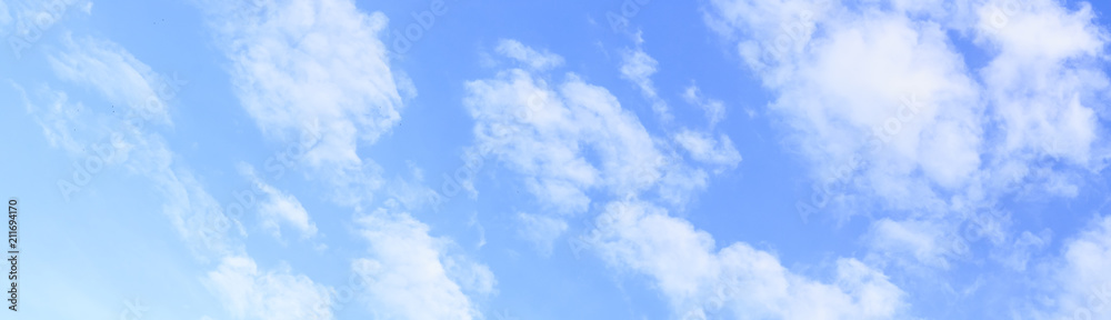 panoramic of blue sky and white clouds, gradient of blue. panoramic of blue sky and white clouds, gradient of blue.
