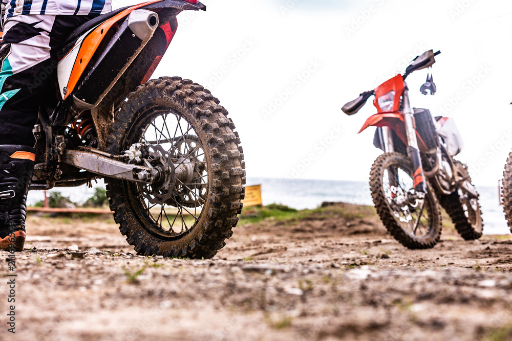 sport motorbike on the side of the road. Biker ready to run sport motorbike on the side of the road. Biker ready to run