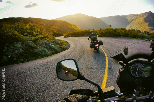 Driving Motorcycle on forest montait twisties road