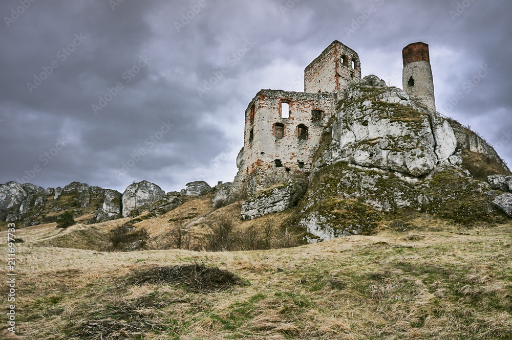 rocks and ruined medieval castle in Olsztyn, Poland.