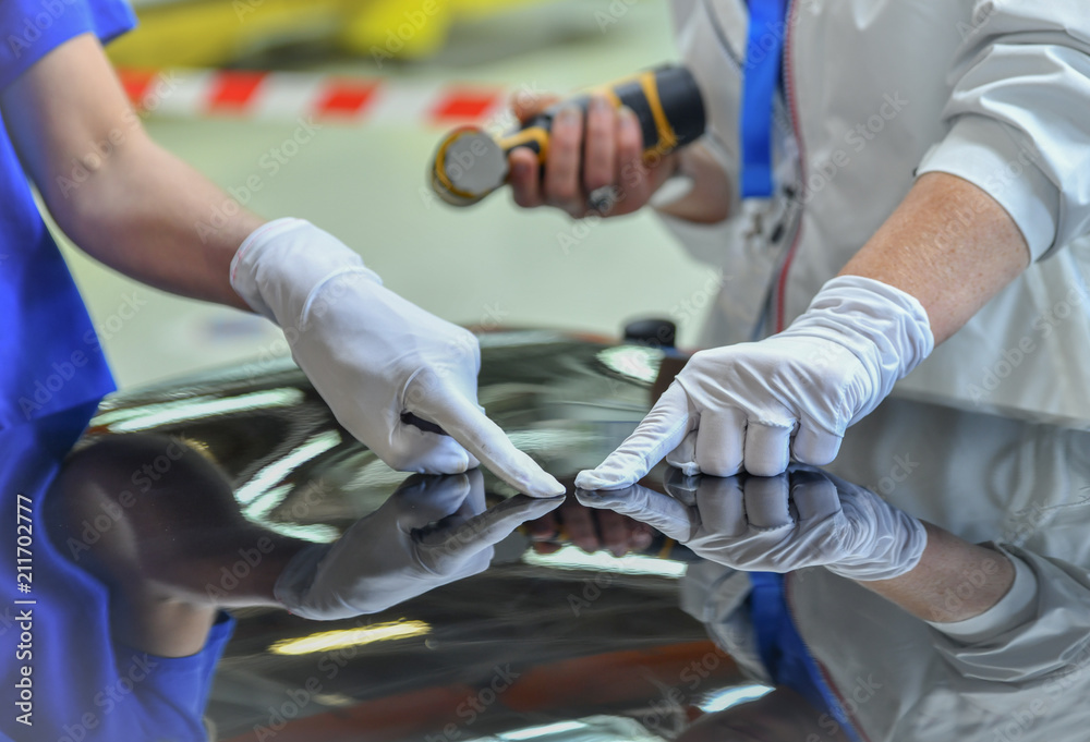 Man holds a polisher in the hand for scratch