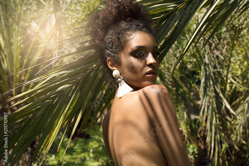 Tropical shoot of african american beauty.