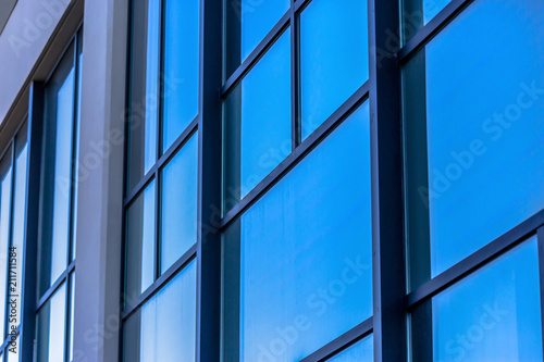 Glass window panes on modern office building