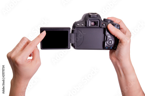 Hands holding the vari angle lcd dslr camera on white background,include clipping path