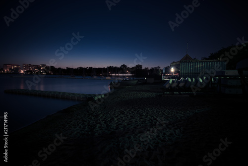 Buildings on the shore of Bde Maka Ska, formerly Lake Calhoun, Minneapolis, Minnesota at night