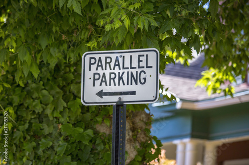 Parallel parking sign with tree