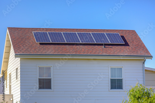Solar panels on model home in Daybreak