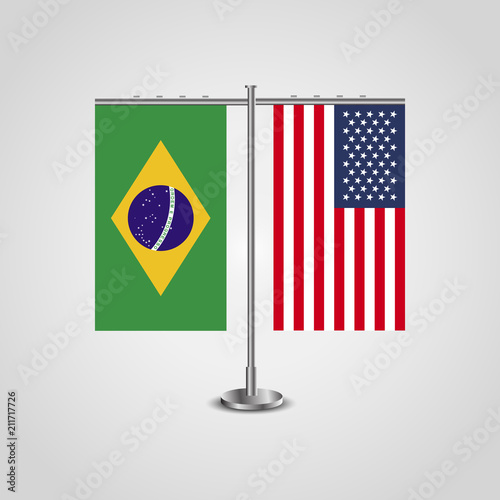 Table stand with flags of Brazil and USA.Two flag. Flag pole. Symbolizing the cooperation between the two countries. Table flags