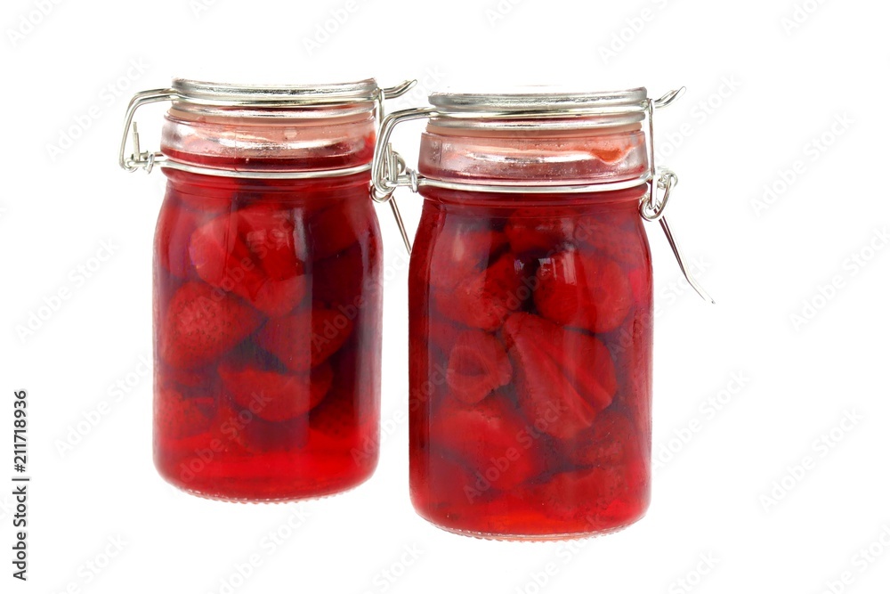 strawberry jam in glass jar isolated on white background. Berry season. strawberry crop strawberry jam in glass jar isolated on white background. Berry season. strawberry crop