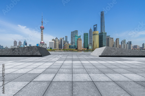 Panoramic shanghai skyline and buildings with empty square floor