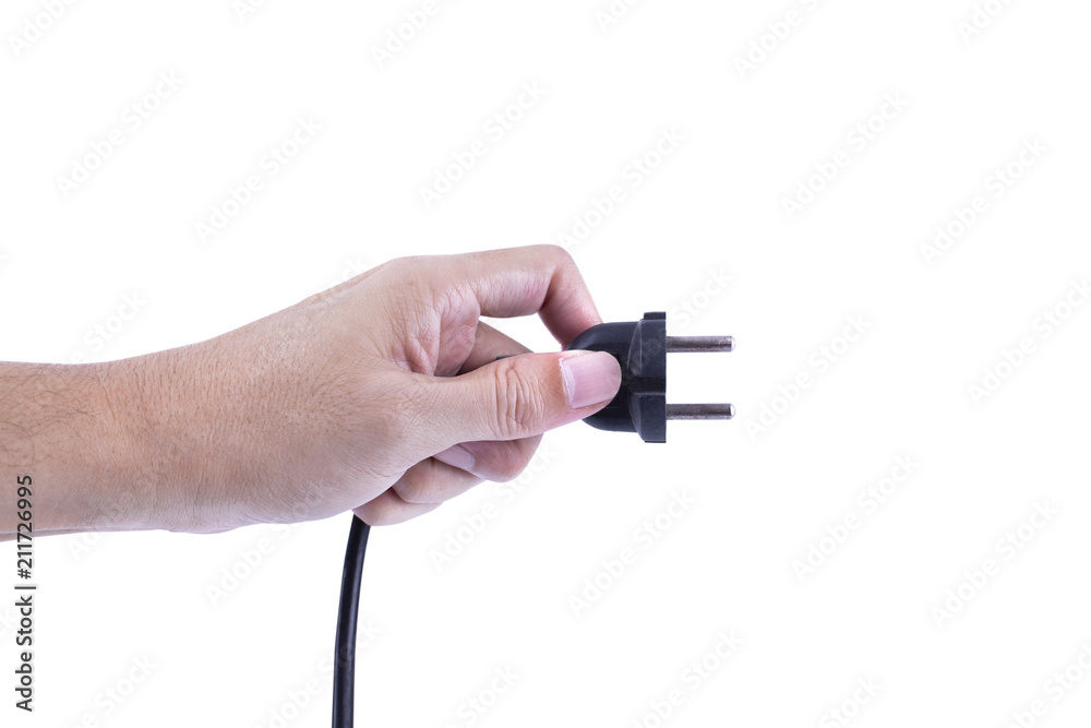 Hand holding Black electrical plug a removable cord from a power outlet on a white background. Save energy Concept Hand holding Black electrical plug a removable cord from a power outlet on a white background. Save energy Concept