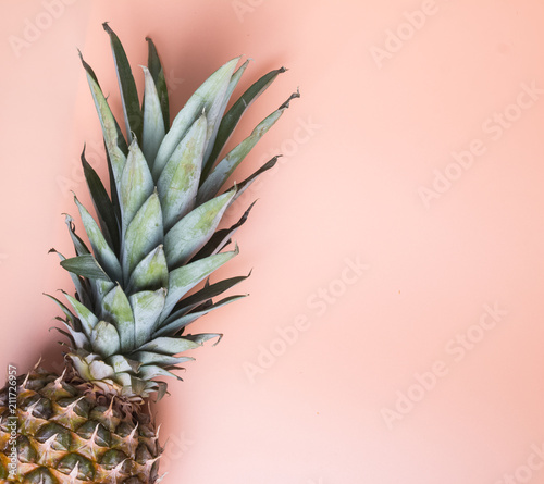 Pineapple on the pastel orange background