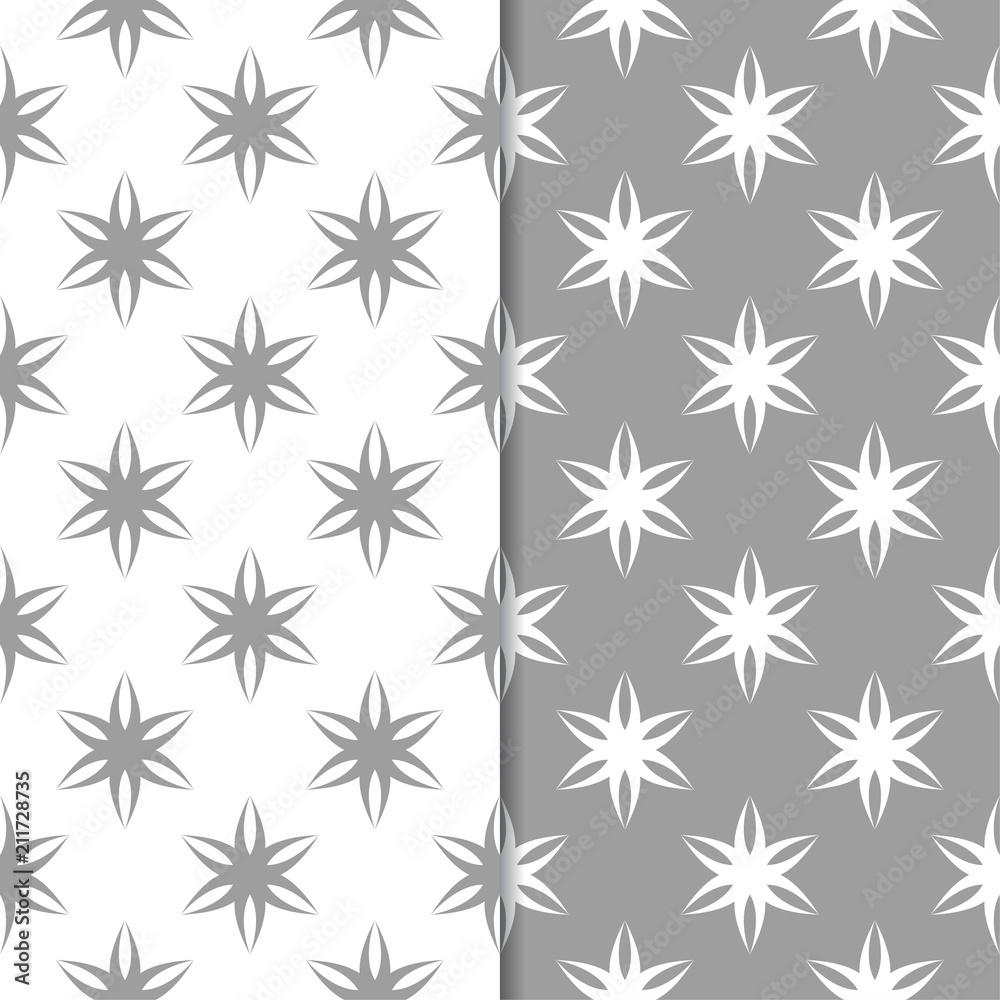 White and gray floral backgrounds. Set of seamless patterns White and gray floral backgrounds. Set of seamless patterns
