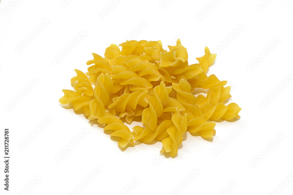 bunch of macaroni in the form of spirals on a white background bunch of macaroni in the form of spirals on a white background