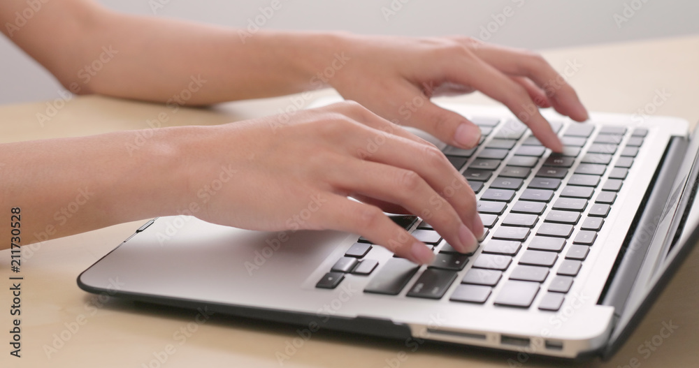 Woman working on laptop computer