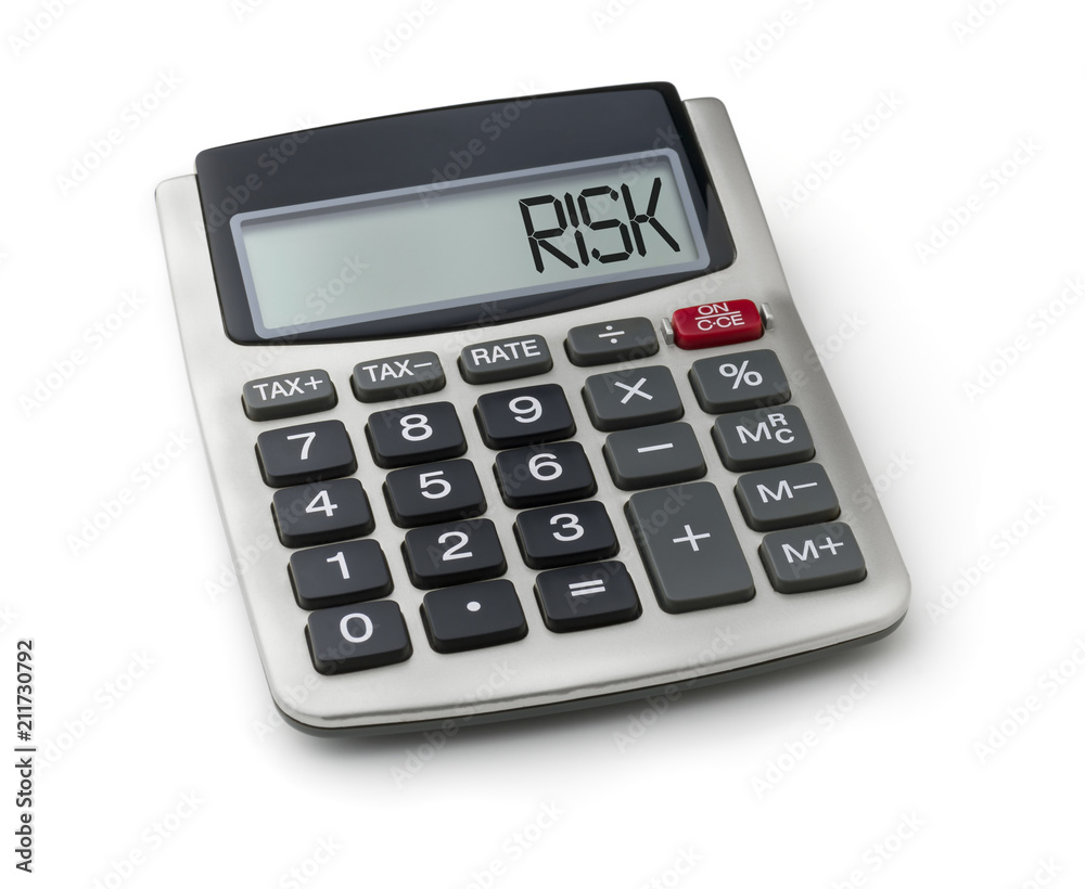 Calculator with the word risk on the display Calculator with the word risk on the display