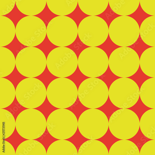Pattern with regular polka dot. Seamless background. Bright orange and yellow. For printing on fabric, paper, wrapper.