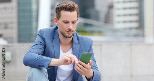 Photography Businessman use of smart phone in city