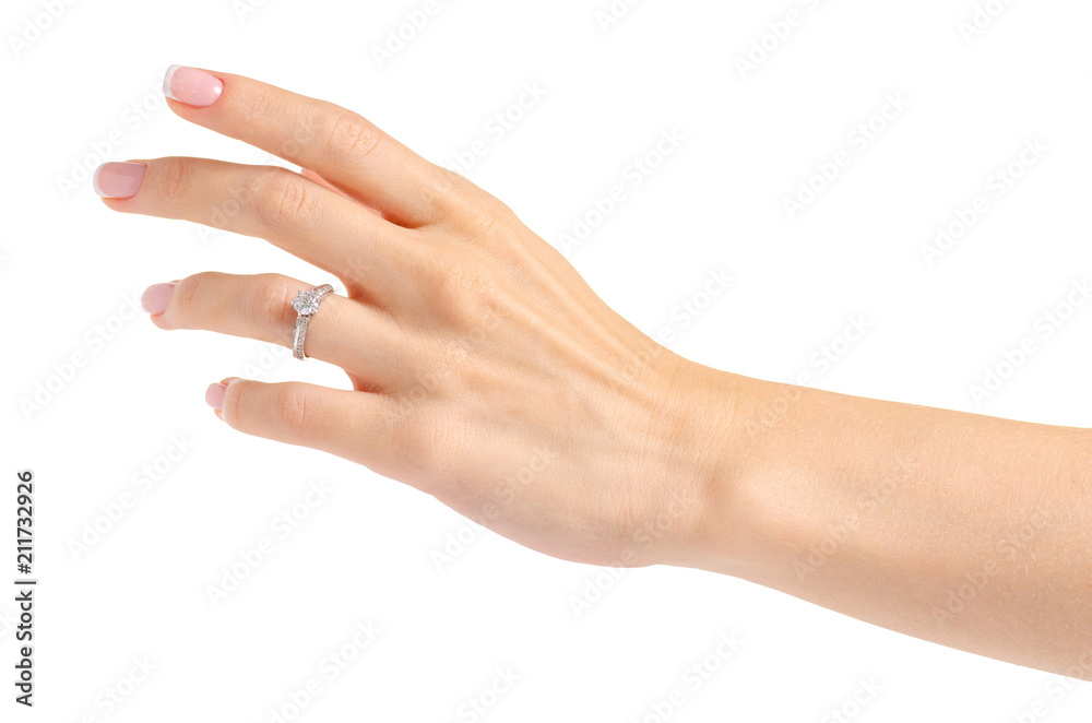 Female hand with a silver gold ring on a white background isolation