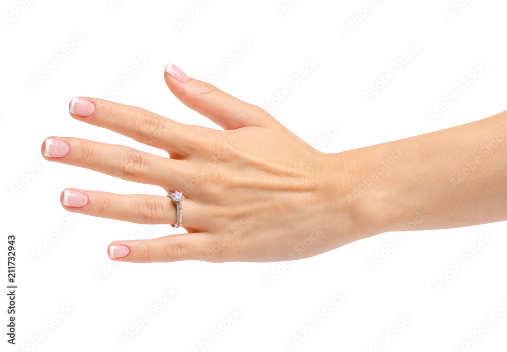 Female hand with a silver ring on a white background isolation