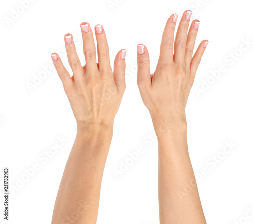 Female hand french manicure hands raised up on a white background isolation
