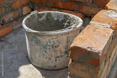 bucket with cement mortar