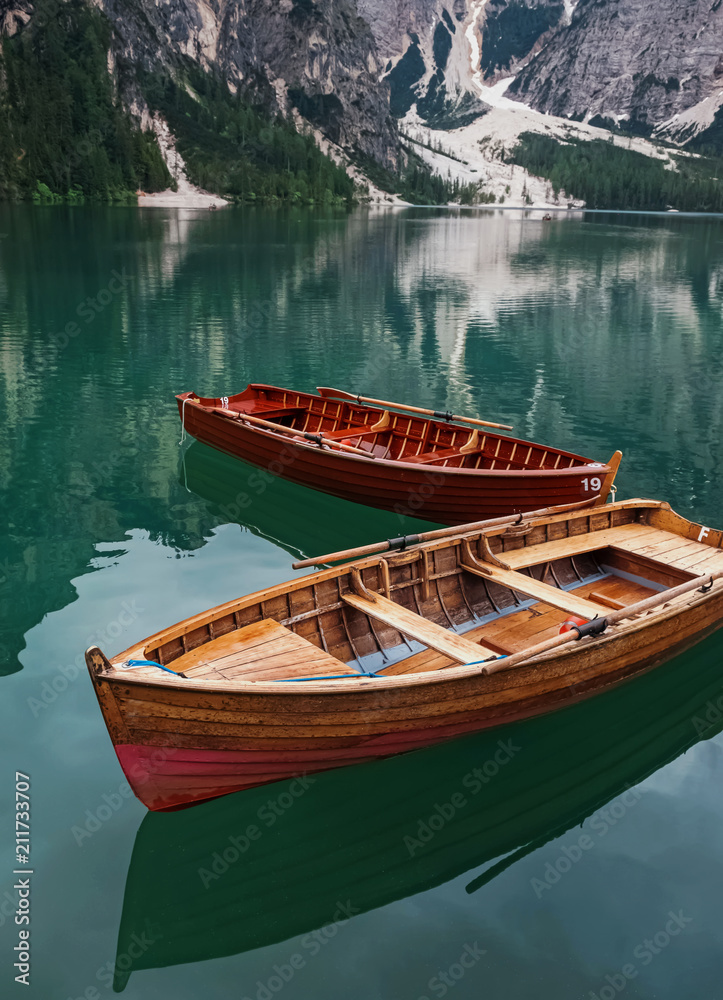Wooden boats on the beautiful lake Braies,