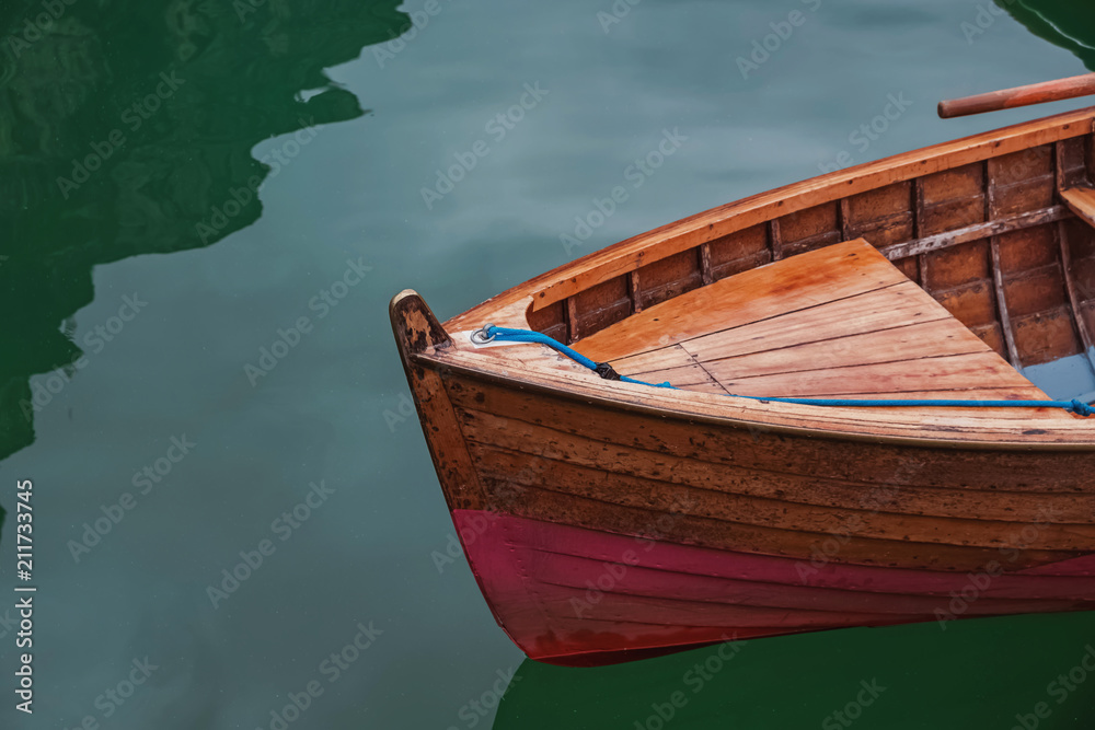 Wooden boat on the beautiful lake