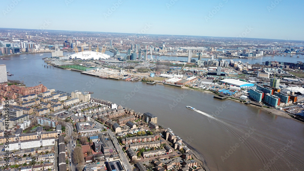 Aerial bird's eye view photo taken by drone of Greenwich village residential area by river Thames, London, United Kingdom