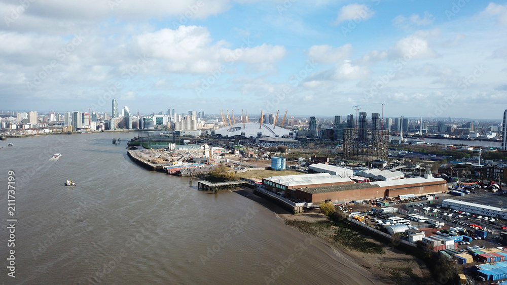 Aerial drone bird's eye view from iconic O2 Arena near isle of Dogs as seen from Greenwich, London, United Kingdom