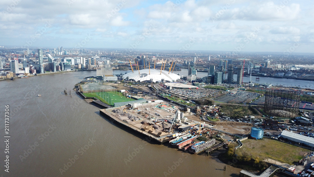 Aerial drone bird's eye view from iconic O2 Arena near isle of Dogs as seen from Greenwich, London, United Kingdom