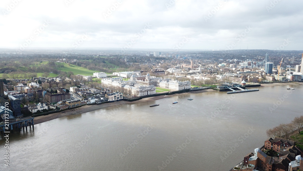 Fototapeta premium Aerial bird's eye view photo taken by drone of Greenwich village residential area by river Thames, London, United Kingdom